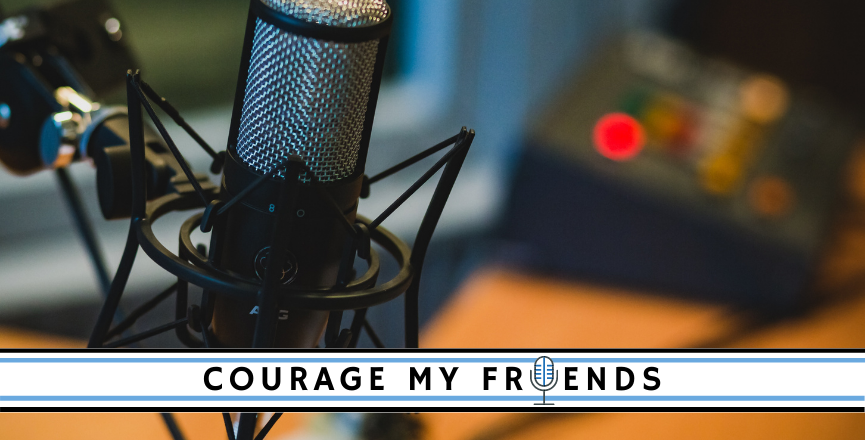 Microphone with "Courage My Friends" logo