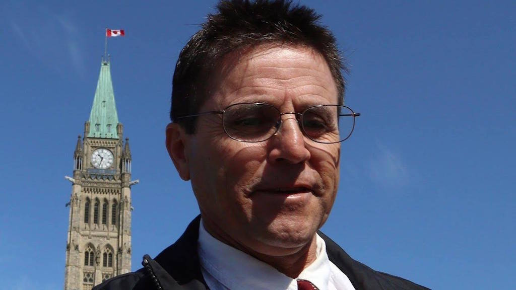 Hassan Diab in front of Parliament in Ottawa. Image: Don Pratt/Facebook