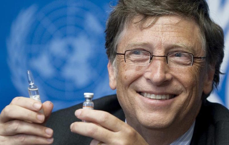 Bill Gates holds up a vaccine during UN press conference in 2011. Image: Jean-Marc Ferré/UN Geneva/Flickr