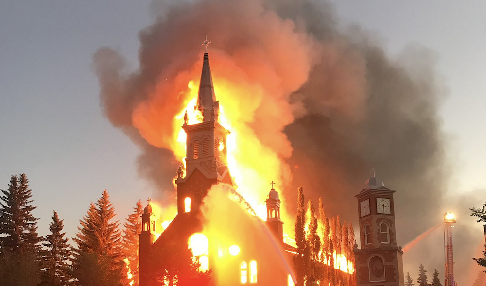 Morinville's Roman Catholic Church burns Tuesday night (Photo: Twitter/Kim Smith, CTV).
