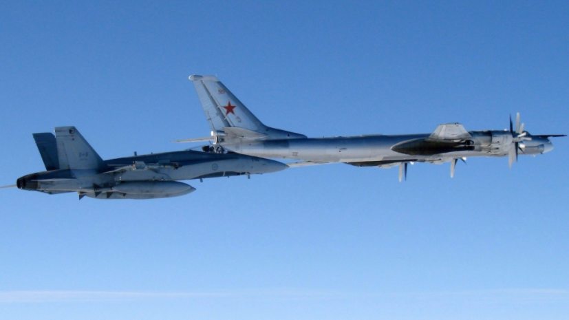 A Canadian Air Force F-18 Hornet jet escorting a Russian TU-95 Bear heavy bomber out of Canadian airspace in 2007. Image: U.S. Air Force photo/Master Sgt. Cecilio M. Ricardo J