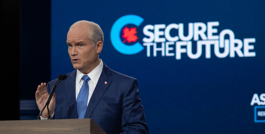 Conservative Party leader Erin O'Toole in front of the party's slogan, "Secure the Future." Image: Erin O'Toole/Flickr