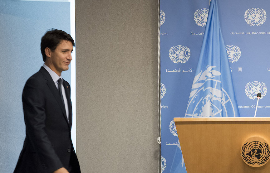 Justin Trudeau approaches a podium at for a press conference held on the margins of the General Assembly’s annual general debate in 2017. Image: UN Photo/Kim Haughton/Flickr
