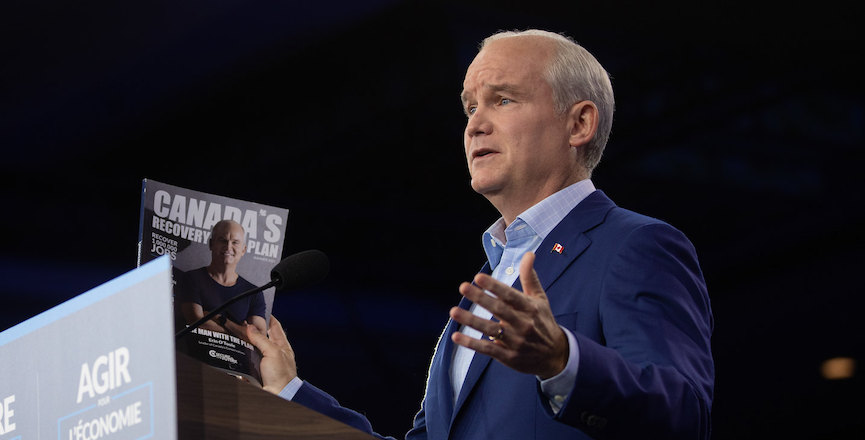 Erin O'Toole speaks at a podium during the 2021 election. Image: Erin O'Toole/Flickr