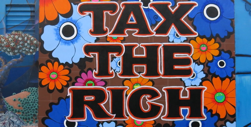 A mural in San Francisco in 2013 that reads "tax the rich." Image: mendolus shank/Flickr