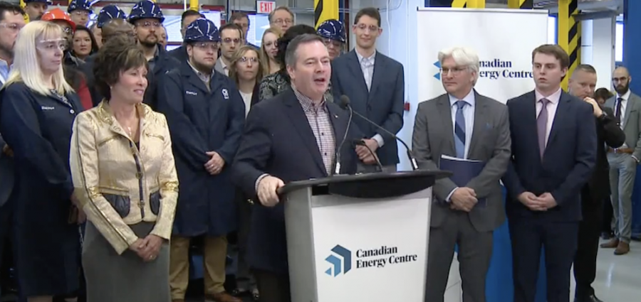 Alberta Premier Jason Kenney opens Canadian Energy Centre Ltd. on Dec. 11, 2019. Energy Minister Sonya Savage is at left, CEC Ltd. CEO Tom Olsen at right. Image: video still/Captured by David Climenhaga