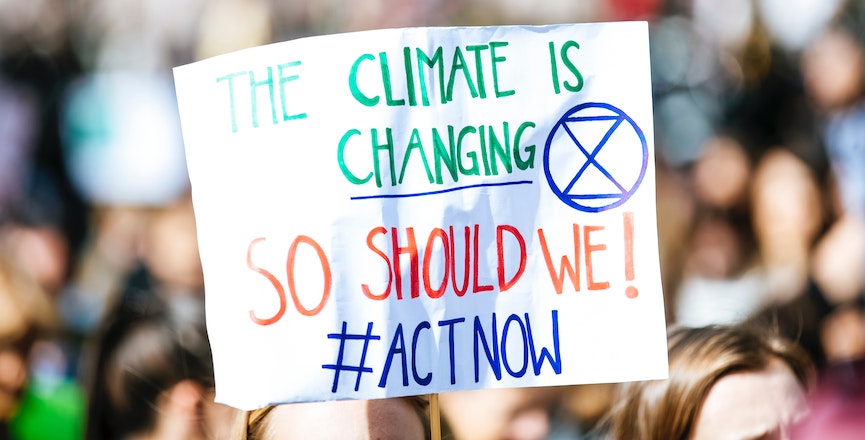 Climate protest sign reading, "The climate is changing, so should we! #ActNow." Image: Markus Spiske/Unsplash