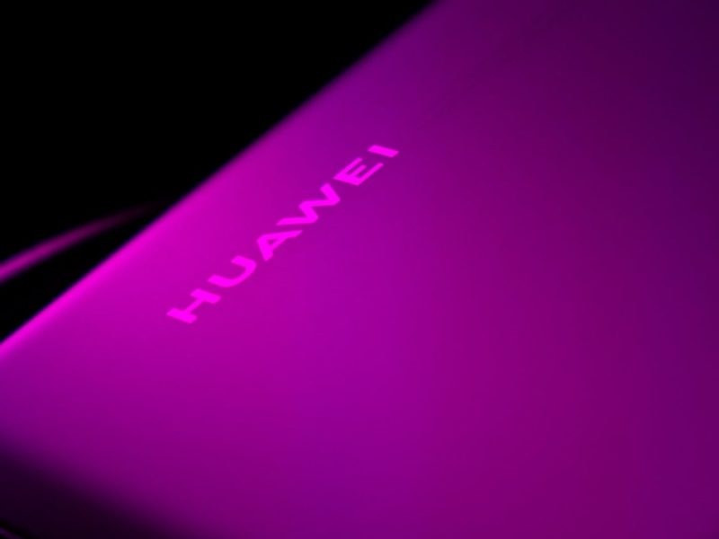 Huawei text on purple background.