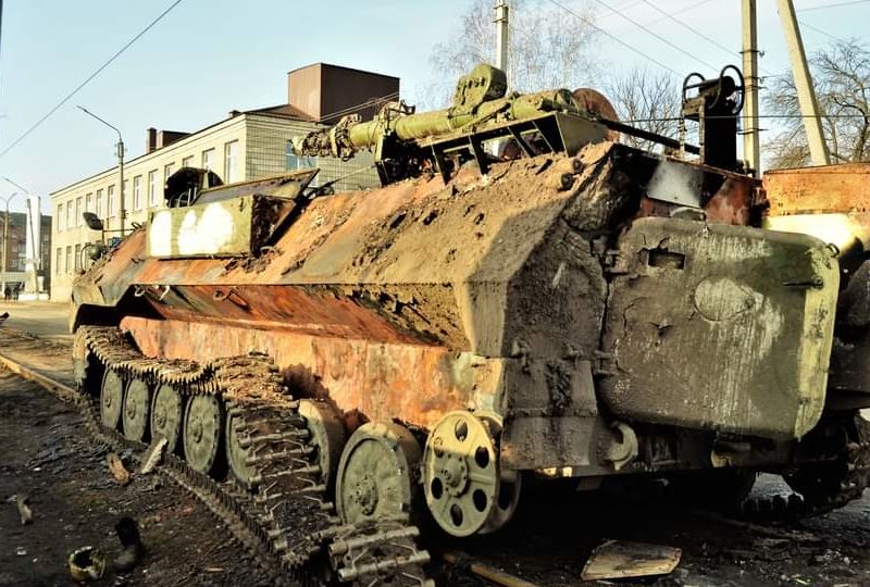 A photo of a destroyed armoured personnel carrier in Ukraine, February 2022.