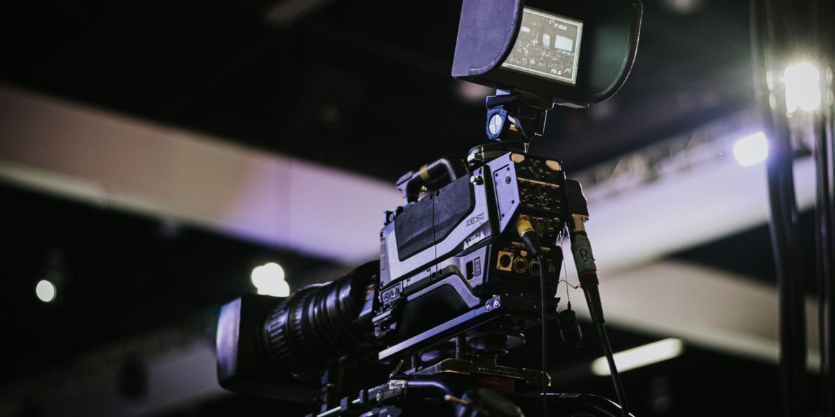 Photo of filming equipment in a dark room.