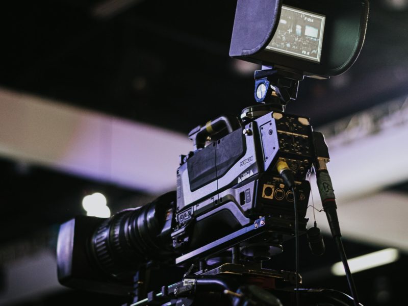 Photo of filming equipment in a dark room.