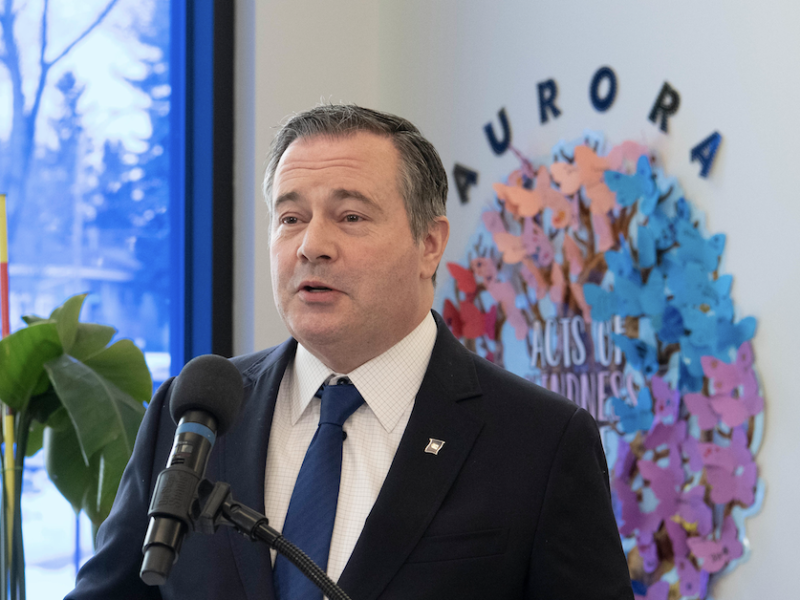 Alberta Premier Jason Kenney, his lapel pin drooping toward the distress position, a week before his secret speech to UCP political staffers.