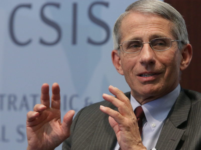 A photo of Dr. Anthony Fauci speaking at a roundtable event about tuberculosis in 2014.