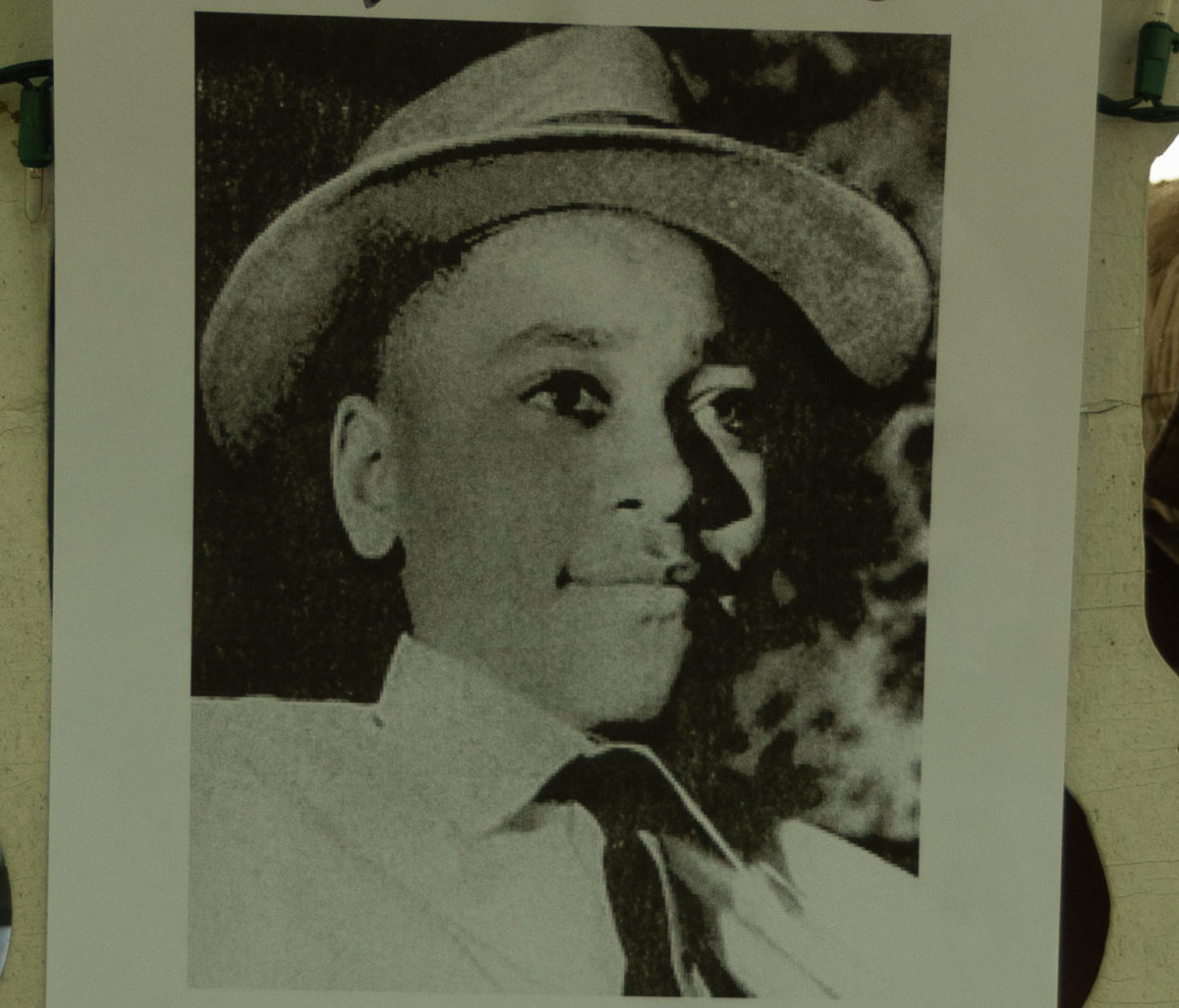 A poster of a photo of Emmett Till.