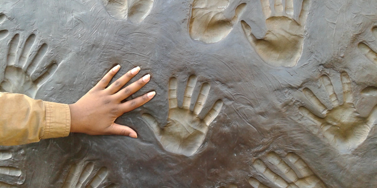 "Helping Hands" sculpture by Ralph Hicks at a drop-in and social housing building in Regent Park, Toronto, Ontario.