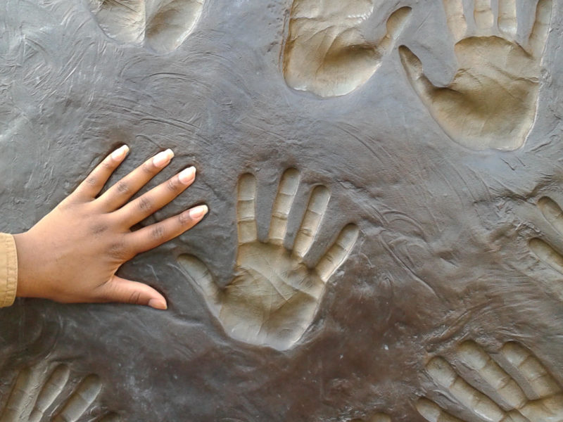 "Helping Hands" sculpture by Ralph Hicks at a drop-in and social housing building in Regent Park, Toronto, Ontario.