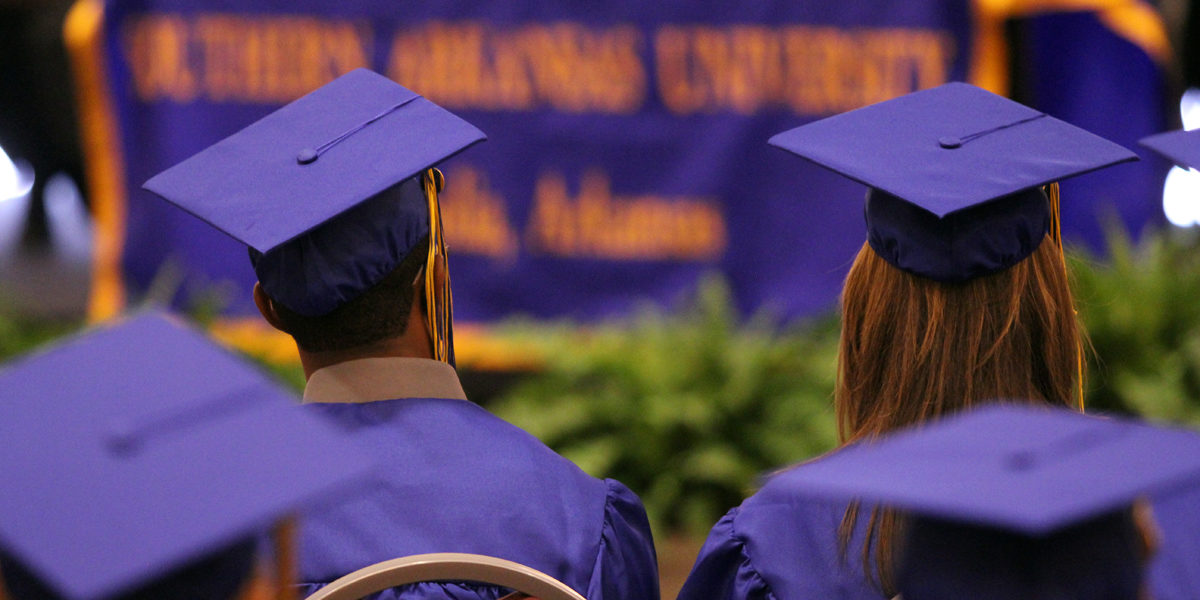 A photo of undergrads preparing to graduate.