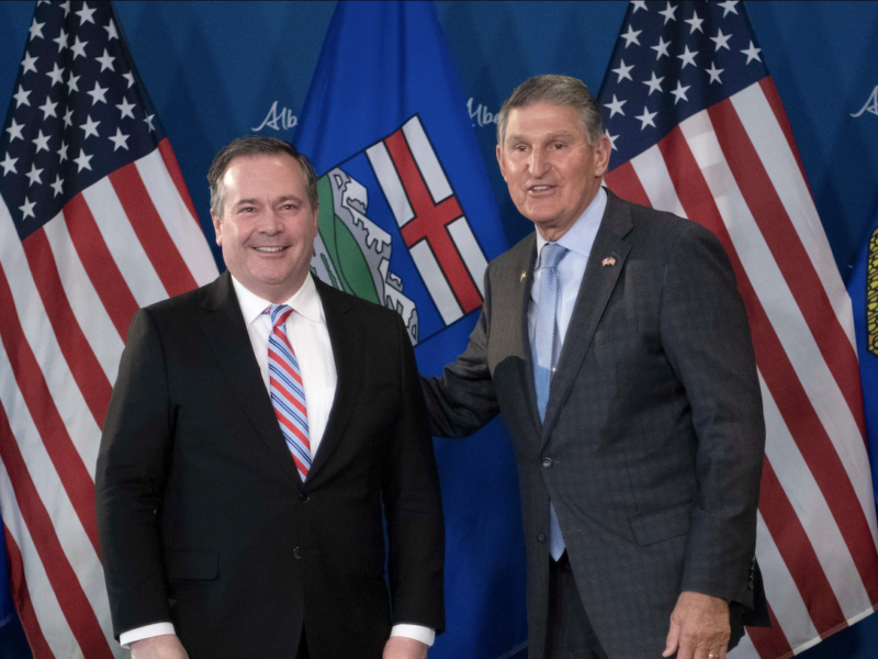 Alberta Premier Jason Kenney and West Virginia Senator Joe Manchin at yesterday’s news conference.