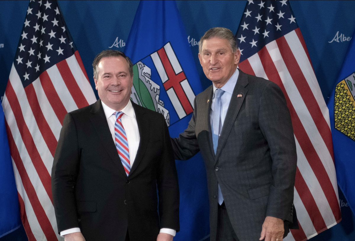 Alberta Premier Jason Kenney and West Virginia Senator Joe Manchin at yesterday’s news conference.