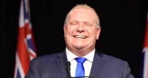 Photo of Ontario Premier Doug Ford smiling.