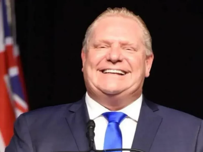 Photo of Ontario Premier Doug Ford smiling.