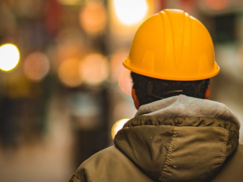 A photo of a worker in a yellow hard hat. On the National Workers Day of Mourning, Canadians who died on the job are remembered.