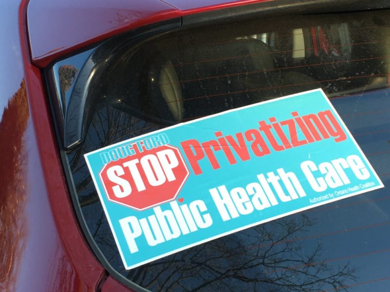 A photo of a car sticker opposing the privatization of healthcare from the Ontario Health Coalition Facebook page.