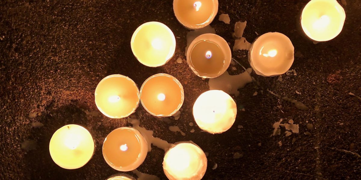 A photo of a vigil at Tam Hill school in the wake of the Parkland shooting.