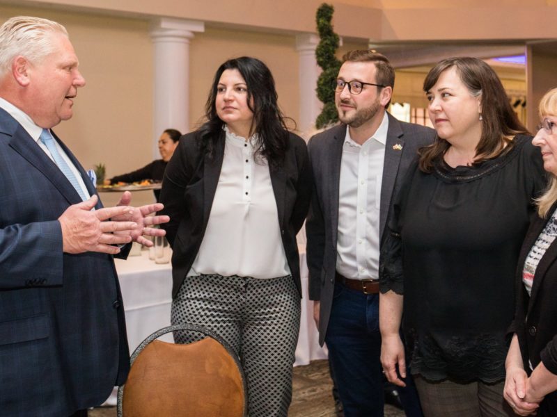 A photo of Doug Ford speaking to members of the Halton Region Chamber of Commerce in April 2022.