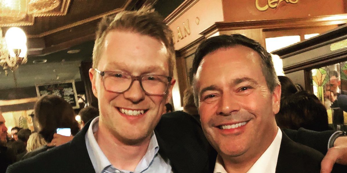 A photo of Brock Harrison with his boss, Alberta Premier Jason Kenney.