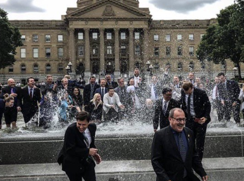 A photo of the United Conservative Party Caucus in happier times – for them, anyway – in July 2019, celebrating their vote to allow schools to inform parents when their children joined gay-straight alliance groups, part of the Summer of Repeal, such as it was.