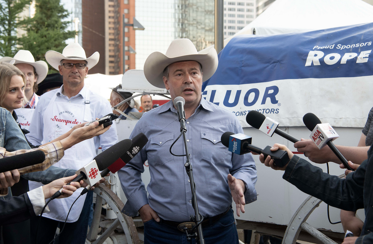 A photo of Alberta Premier Jason Kenney, illustrated today with Calgary’s Western culture in mind, seems anxious to show he’s still relevant as UCP members have a few more days to vote on his future.