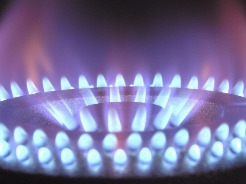 A photo of the blue flame of a gas burner.