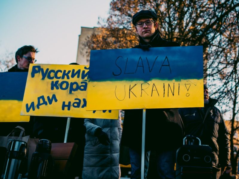 A photo of people protesting against war in Ukraine in front of the Russian embassy in Vilnius, Lithuania.