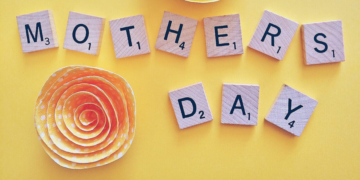 A photo featuring the words Mother's Day.