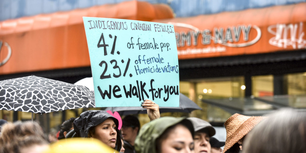 A photo of an Indigenous protest in Canada demanding action on the issue of Missing Murdered Indigenous Women and Girls (MMIWG).