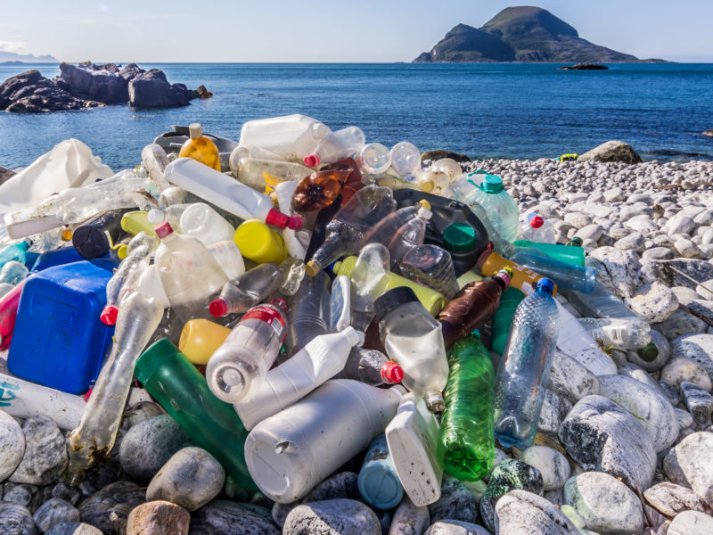 A photo of plastic waste on a beach.