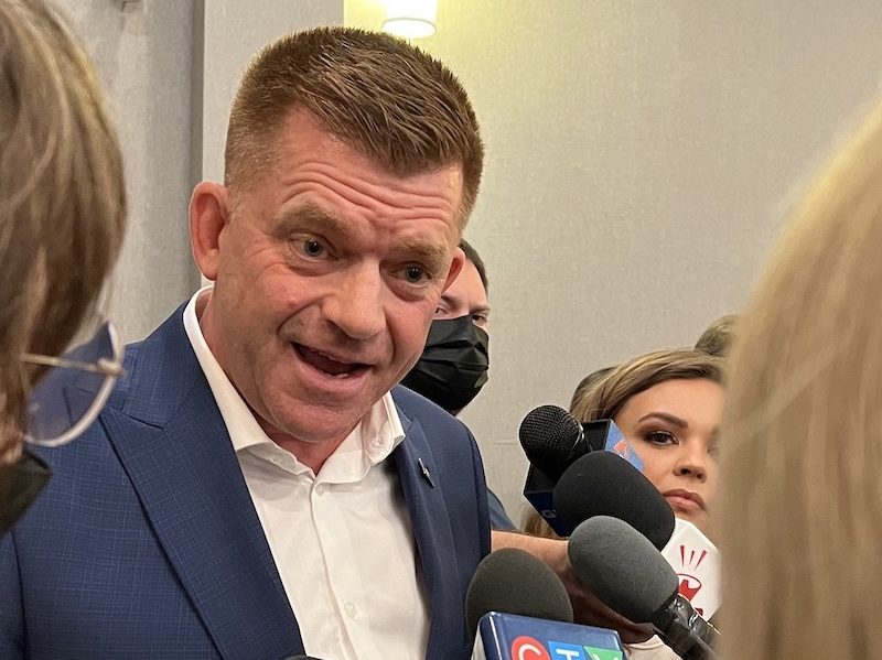 A photo of UCP leadership candidate Brian Jean addresses the media at his campaign launch last night.