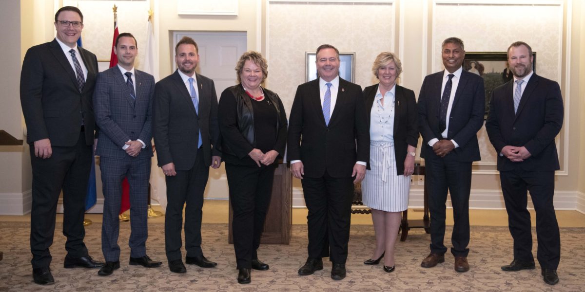 A photo of Jason Kenney and members of his newly shuffled cabinet.