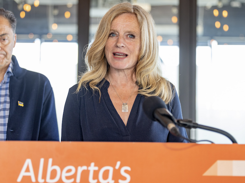 A photo of Alberta NDP Opposition Leader and former premier Rachel Notley at yesterday’s news conference in Calgary, with Calgary MLA and Municipal Affairs Critic Joe Ceci in the background.