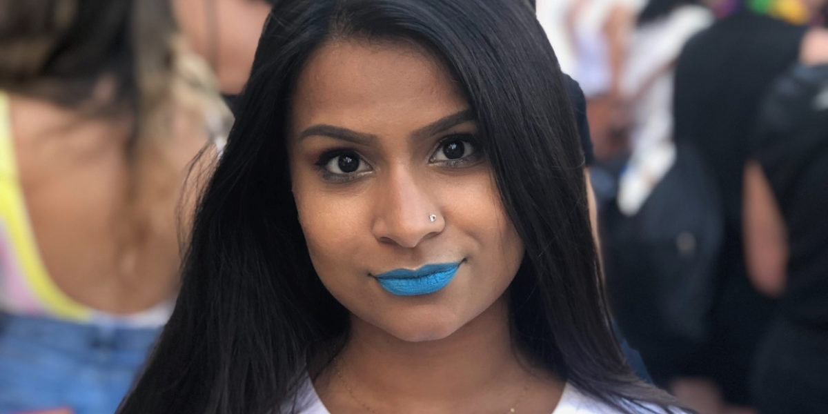 Photo of Alyy Patel with blue lipstick