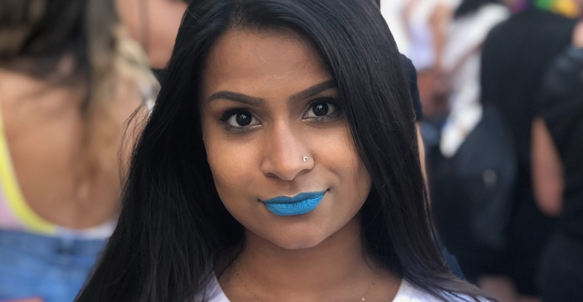 Photo of Alyy Patel with blue lipstick