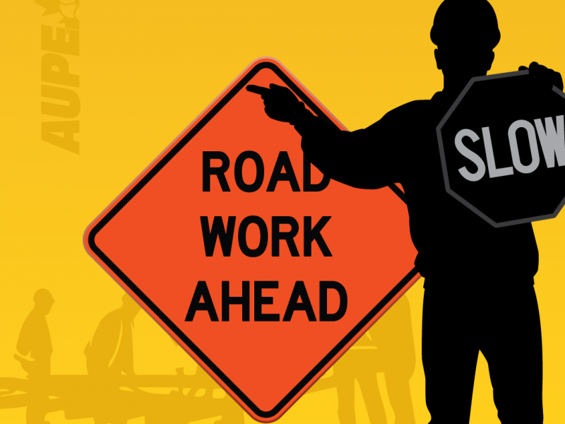 Image of an orange diamond sign reading Road Work Ahead with a silhouette of a construction worker holding a sign that reads slow. Logo of the Alberta Union of Provincial Employees watermark.Alberta Traffic Safety Act