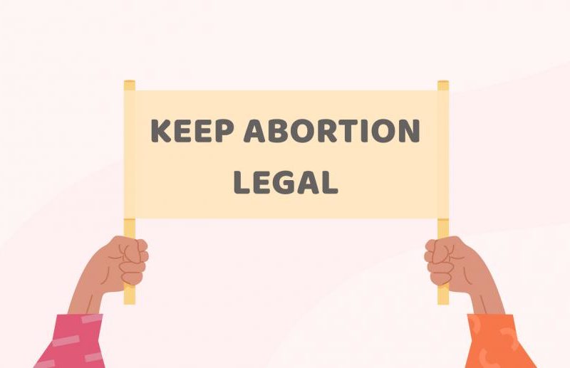 Clip-art image of two hands holding a banner reading "Keep abortion legal"