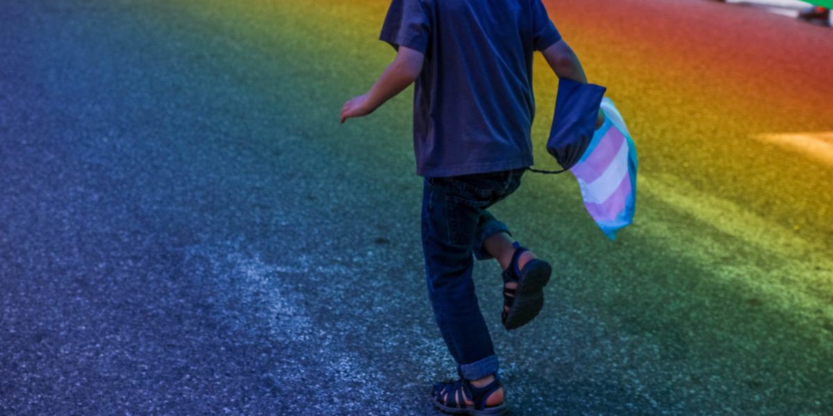 Child running through Pride Parage