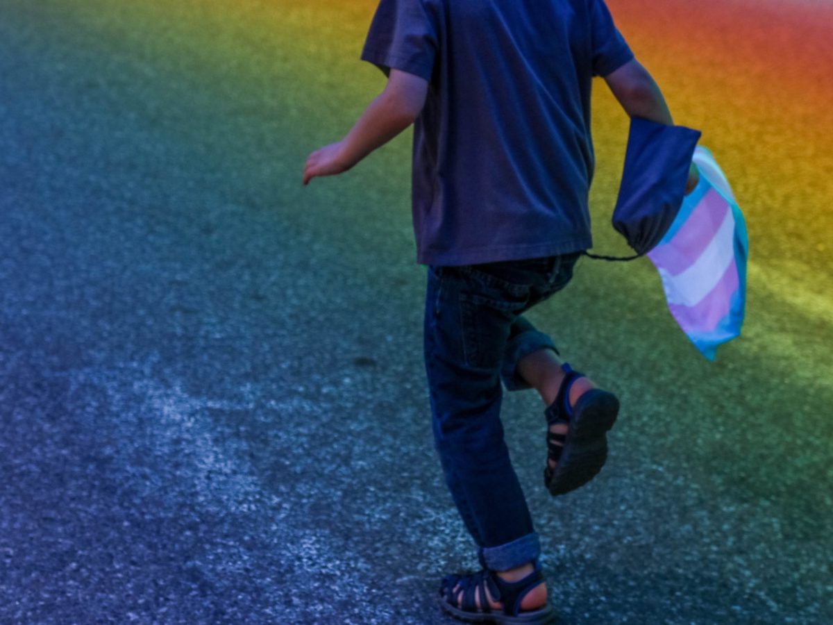 Child running through Pride Parage