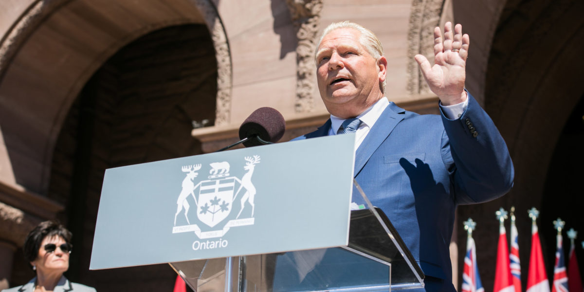 A photo of Premier Doug Ford unveiling his cabinet on June 24.