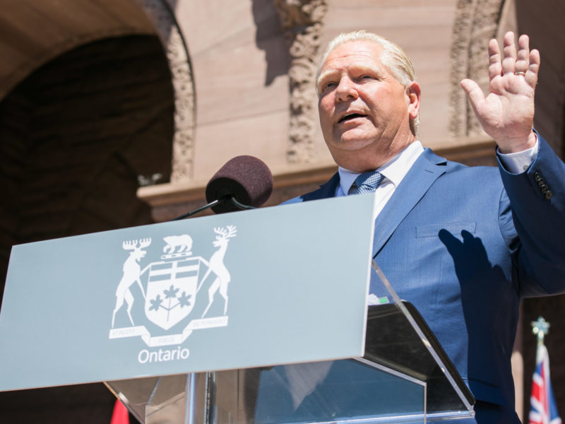 A photo of Premier Doug Ford unveiling his cabinet on June 24.