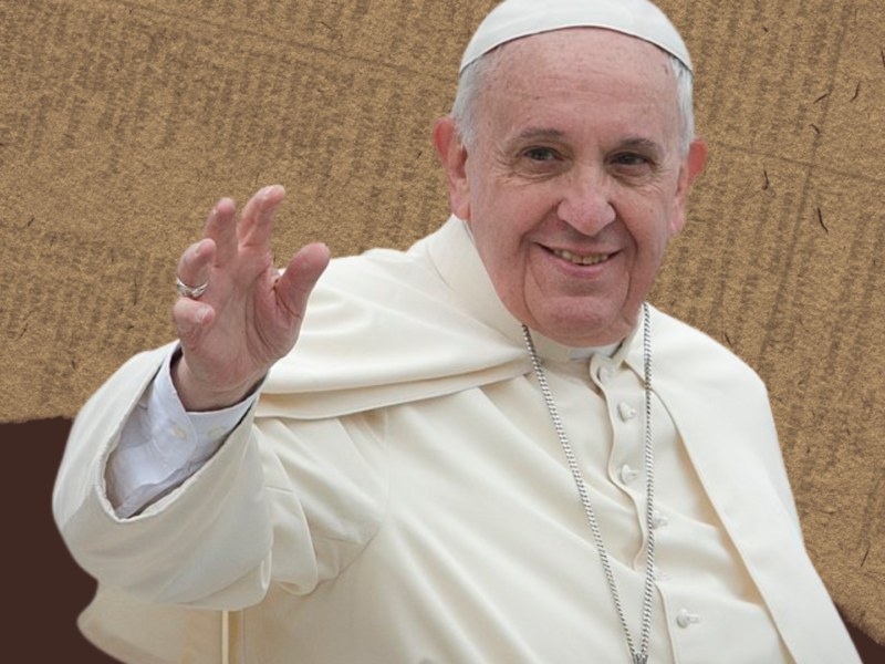 A photo of The Pope waving his hand