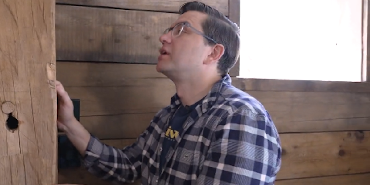 A photo of Federal Conservative leadership candidate Pierre Poilievre as he strokes his wood in a screenshot of his latest campaign video.